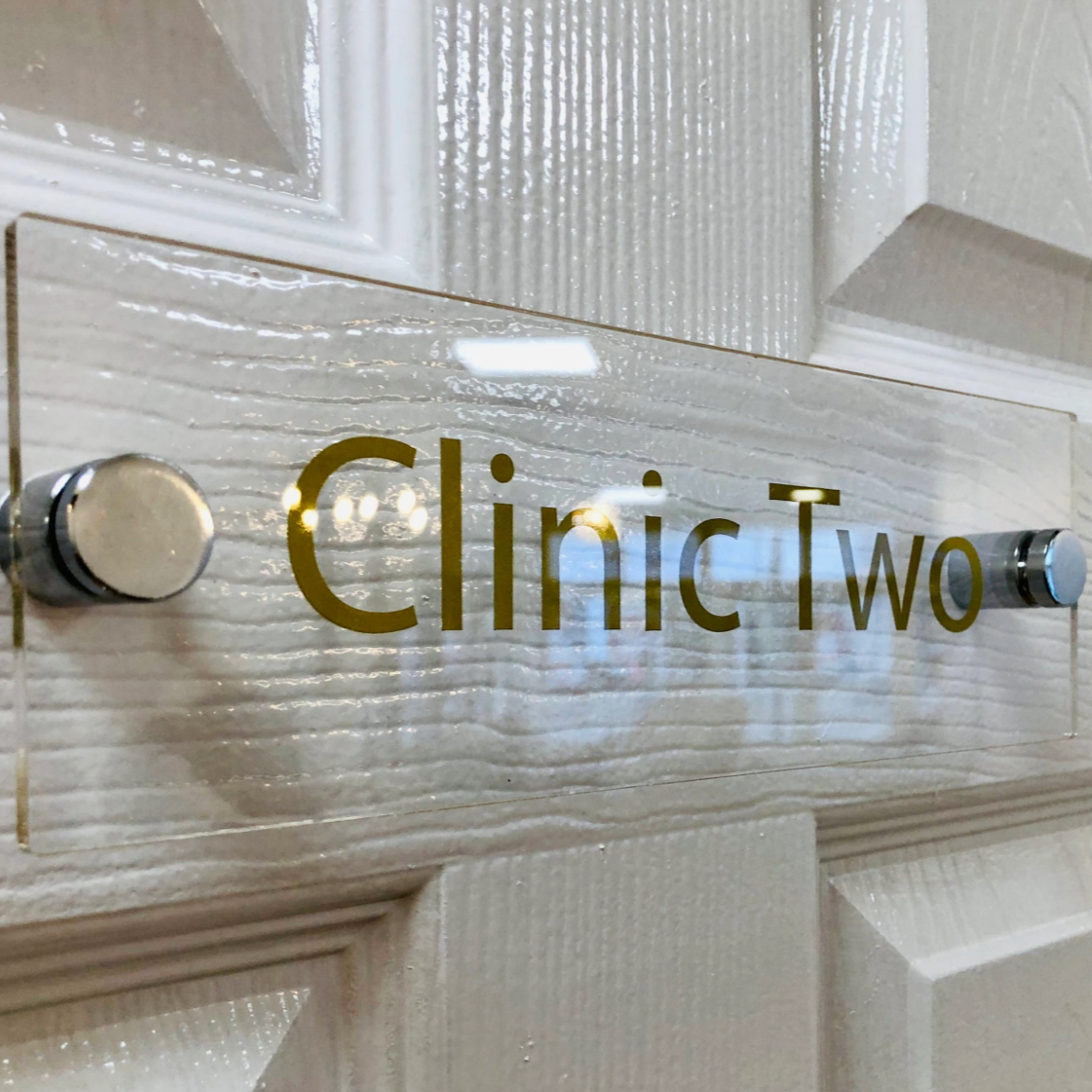 Clinic door plaque